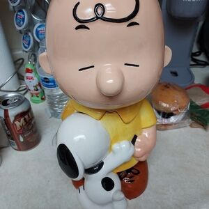 Peanuts Charlie Brown and Snoopy ceramic cookie jar. It was released by Westland